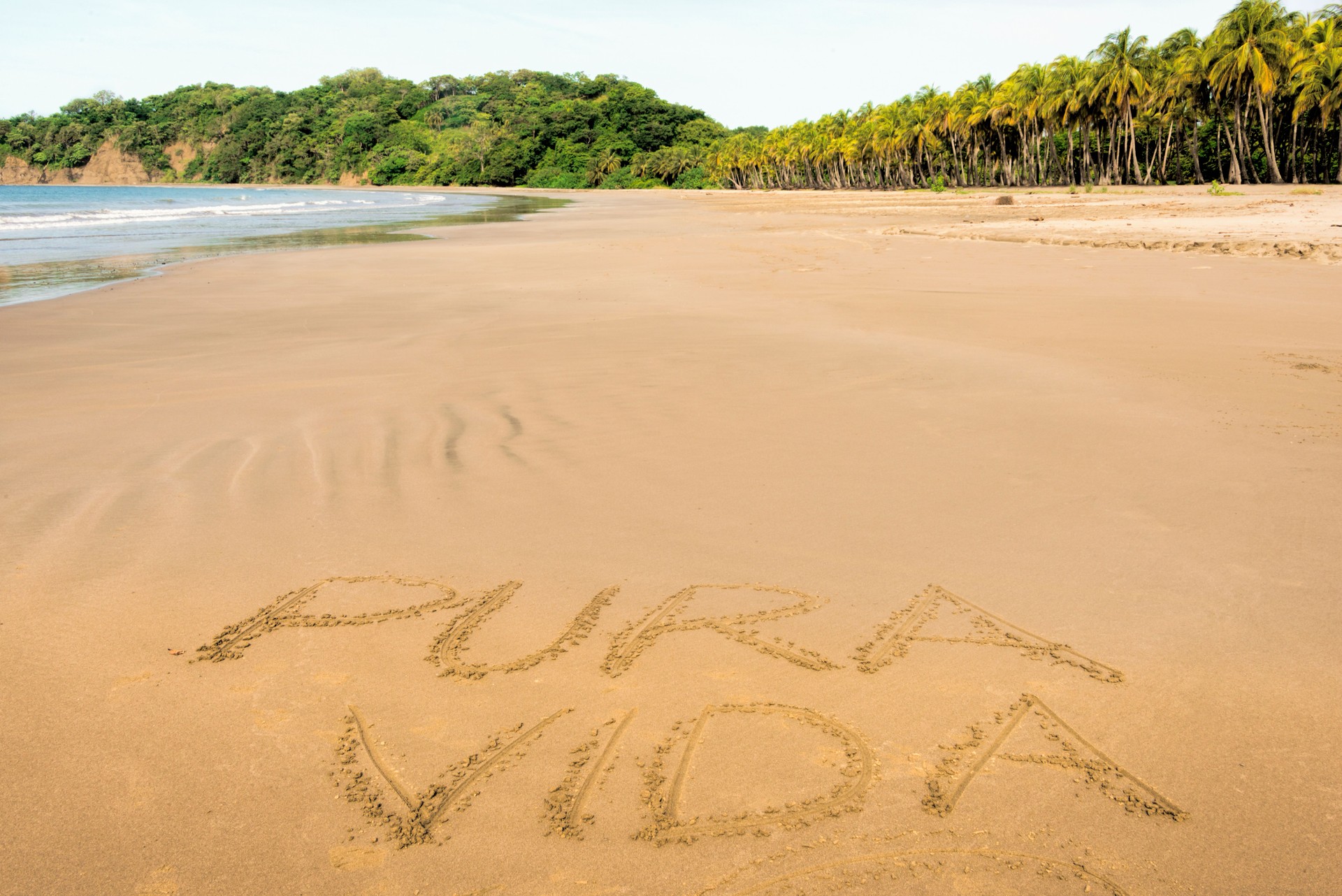 XXXL: Pura Vida written on Costa Rican beach